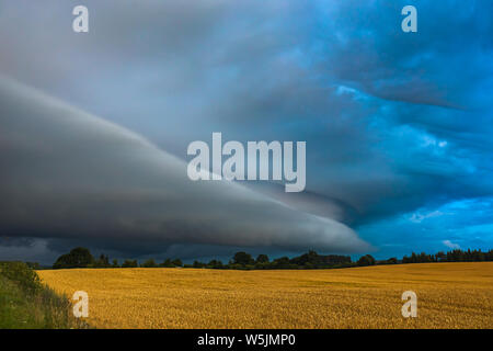 Storm clouds with shelf cloud and intense rain Stock Photo