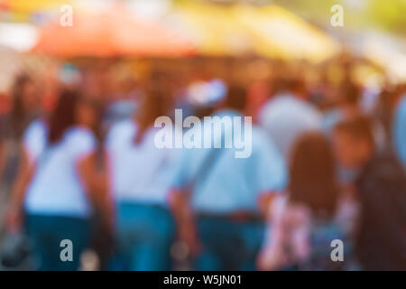 Blur city commuters walking on street, unrecognizable crowd out of focus as background for various community and people related themes Stock Photo