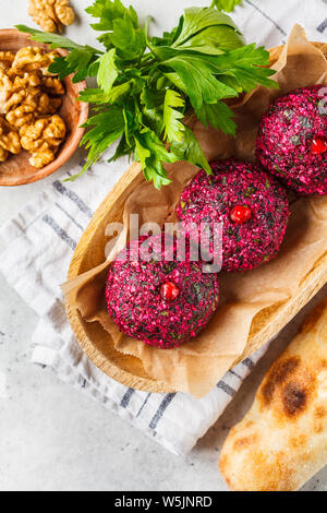 Georgian traditional beet pkhali in a wooden bowl Stock Photo - Alamy