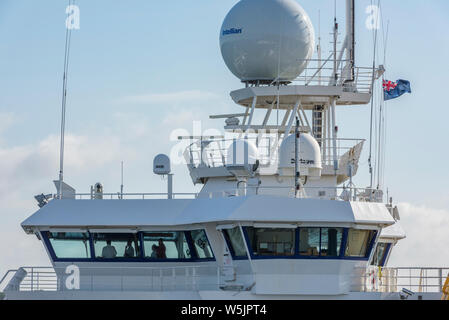 the RRC James Cook survey oceanography seabed exploration vessel bridge entering Southampton water. Stock Photo