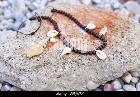 bohemian summer jewelry with shells - cowrie shells necklaces