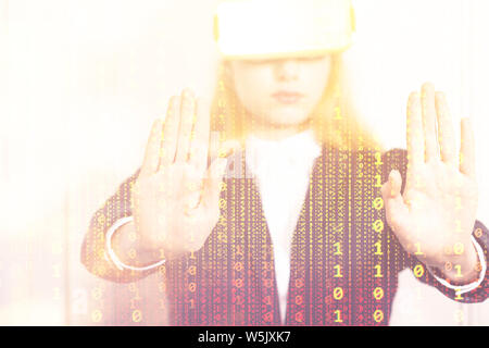 Young tech woman in Virtual reality headset device manipulate digital binary code numbers with hands Stock Photo