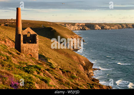 Abandoned Towanroath Shaft Pumping Engine House at Wheal Coates tine mine Celtic Sea Cornwall England with Great Wheal Charlotte and RAF Portreath Stock Photo
