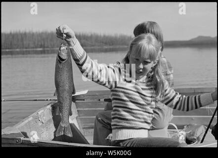 Amy Carter catches a fish while vacationing in the Grand Tetons. Stock Photo