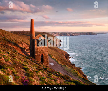 Towanroath Shaft Pumping Engine House ruins at Wheal Coates tine mine on the cliffs of Celtic Sea Cornwall England with Great Wheal Charlotte
