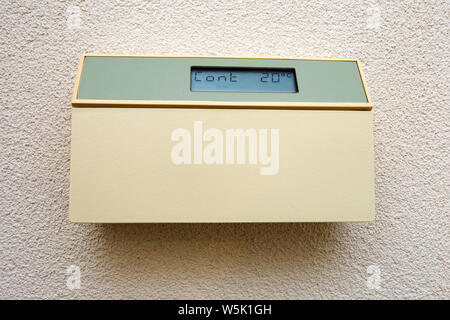 digital climate control ,thermostat in a house Stock Photo