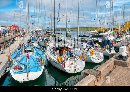 Sterns of yachts tied up in Lerwick Harbour on Shetland Mainland. Stock Photo