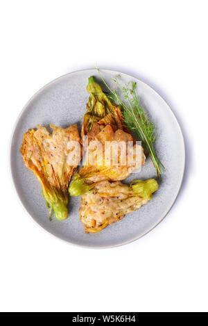fried zucchini flowers  deep fried on plate isolated on white background Stock Photo