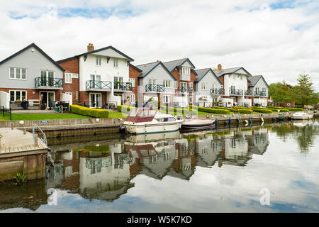 Loddon Quay wharf houses at Loddon Marina, Norfolk Broads,Norwich, England, UK Stock Photo