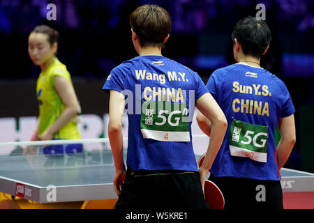 Sun Yingsha and Wang Manyu of China react as they compete against Hina Hayata and Mima Ito of Japan in their final match of Women's Doubles during the Stock Photo