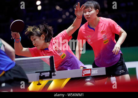 Chen Meng of China serves against Belma Busatlic and Emina Hadziahmetovic of Bosnia and Herzegovina in their first round match of Women's Doubles duri Stock Photo