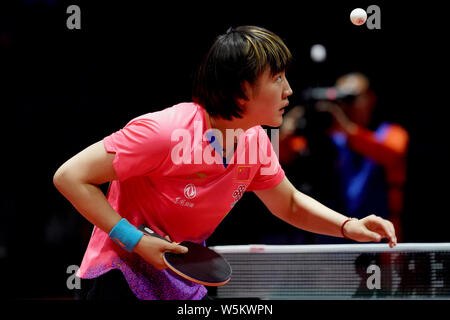 Chen Meng of China serves against Belma Busatlic and Emina Hadziahmetovic of Bosnia and Herzegovina in their first round match of Women's Doubles duri Stock Photo