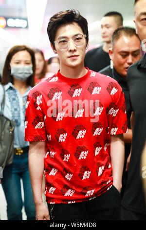 --FILE--Chinese actor Yang Yang arrives at the Shanghai Hongqiao International Airport in Shanghai, China, 23 June 2018. Stock Photo