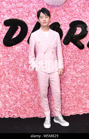 --FILE--Chinese actor Huang Xuan attends a promotional event by Dior in Beijing, China, 10 January 2019. Stock Photo