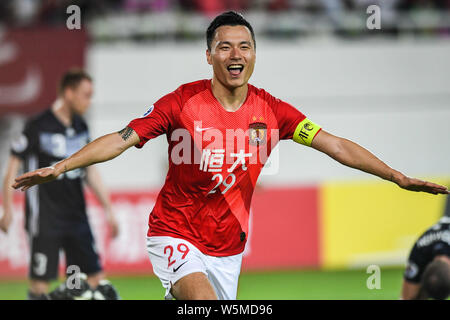 Gao Lin of China's Guangzhou Evergrande celebrates after scoring Guangzhou Evergrande's fourth goal against Australia's Melbourne Victory during their Stock Photo