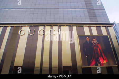 --FILE--View of a signboard of Gucci in Wuhan city, central China's Hubei province, 8 September 2014.    French luxury group Kering S.A., which owns G Stock Photo