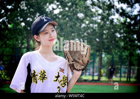 --FILE--Zhang Zetian, also known as milk tea girl, the wife of Liu Qiangdong, Chairman and CEO of JD.com, poses for a poster for Tsinghua University i Stock Photo