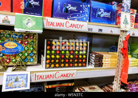 A shopper chooses a bag of Ferrrara Candy Co.'s Brach's hard candy in a  supermarket in New York on Friday, December 9, 2016. Media reports that the  former CEO of Hershey's David