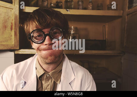 Crazy scientist in his lab doing experiments Stock Photo