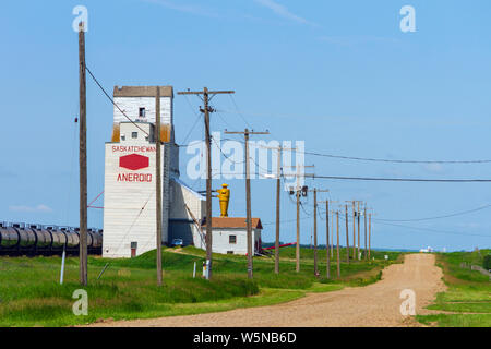 Aneroid, Saskatchewan, Canada - July 8, 2019: Landscape scenic view of old wooden grain elevator in the Canadian prairie town of Aneroid, Saskatchewan Stock Photo