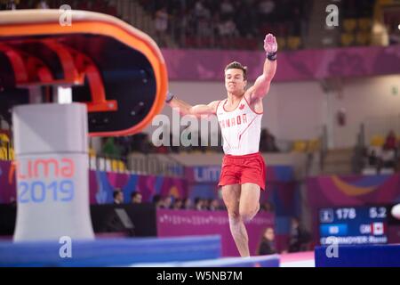 Lima, Peru. 28th July, 2019. Rene Cournoyer (#83) of Canada runs towards the vault during the Pan American Games Artistic Gymnastics, Men's Team Qualification and Final at Polideportivo Villa el Salvador in Lima, Peru. Daniel Lea/CSM/Alamy Live News Stock Photo