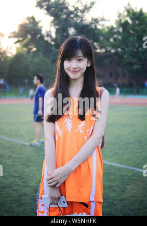 --FILE--Zhang Zetian, also known as milk tea girl, the wife of Liu Qiangdong, Chairman and CEO of JD.com, poses for a poster for Tsinghua University i Stock Photo