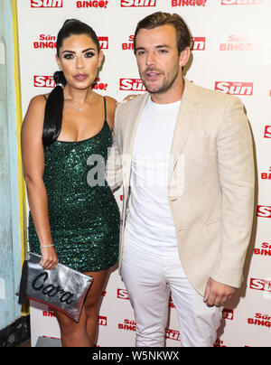 London, UK. 29th July, 2019. Cara de la Hoyde and Nathan Massey attending The Sun's Love Island Finale Party at the Tropicana Beach Club in London Credit: SOPA Images Limited/Alamy Live News Stock Photo