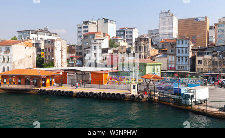 Istanbul, Turkey - July 1, 2016: Karakoy street view with colorful houses, commercial quarter in the Beyoglu district of Istanbul, Turkey, located at Stock Photo