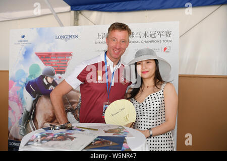 Dutch equestrian Jur Vrieling signs autographs for fans during the Shanghai Grand Prix of the 2019 Shanghai Longines Global Champions Tour in Shanghai Stock Photo