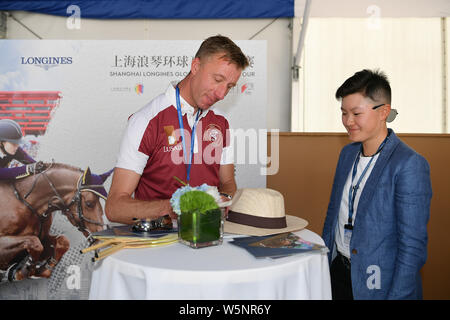 Dutch equestrian Jur Vrieling signs autographs for fans during the Shanghai Grand Prix of the 2019 Shanghai Longines Global Champions Tour in Shanghai Stock Photo