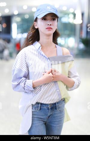 Chinese actress Wu Jinyan arrives at an airport in Shanghai, China, 7 May 2019. Stock Photo