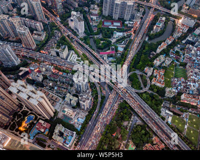 --FILE--An aerial view of elevated highways, viaducts and clusters of residential buildings  in Guangzhou city, south China's Guangdong province, 25 A Stock Photo