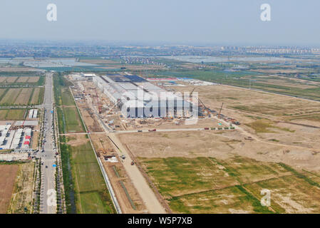 Aerial view of the Tesla Shanghai Gigafactory under construction in Lingang, Shanghai, China, 10 May 2019.   In the latest aerial photos of the Tesla Stock Photo