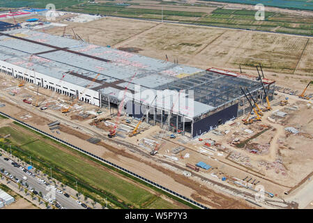 Aerial view of the Tesla Shanghai Gigafactory under construction in Lingang, Shanghai, China, 10 May 2019.   In the latest aerial photos of the Tesla Stock Photo