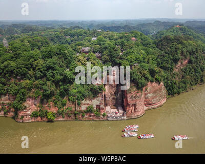 Aerial view of the Leshan Giant Buddha after renovating its damaged chest and abdomen and remove algae on its face in Leshan city, southwest China's S Stock Photo