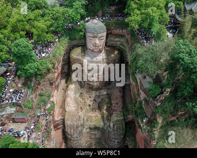 Aerial view of the Leshan Giant Buddha after renovating its damaged chest and abdomen and remove algae on its face in Leshan city, southwest China's S Stock Photo