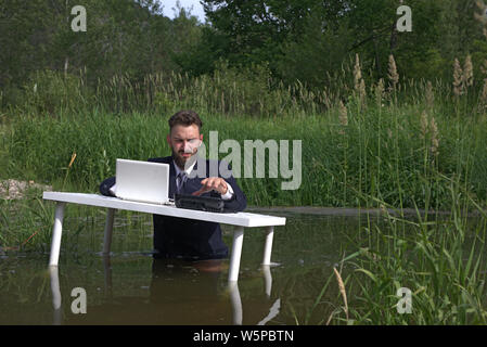 lazy young millennial man tired of work and feel lazy lack of motivation. does not want to work Stock Photo
