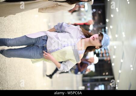 Chinese actress Wu Jinyan arrives at an airport in Shanghai, China, 7 May 2019. Stock Photo