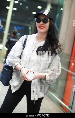 Chinese actress Liu Yifei arrives at the Beijing Capital International Airport before departure in Beijing, China, 11 May 2019.   Shoes: Roger Vivier Stock Photo