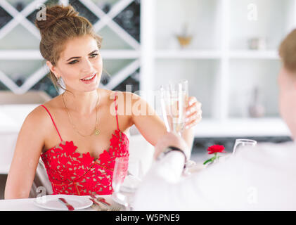 Friends in the restaurant having a toast. Stock Photo