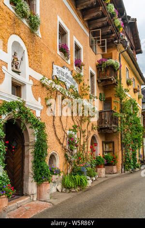 HALLSTATT, AUSTRIA - JULY 08 2019:Hallstatt, a town on Hallstatter Lake in Salzkammergut region was declared World Heritage Site in 1997. It's known f Stock Photo