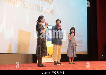 Japanese film director Rikiya Imaizumi, center, attends a press conference for new movie 'Little Nights, Little Love' during the 22nd Shanghai Interna Stock Photo