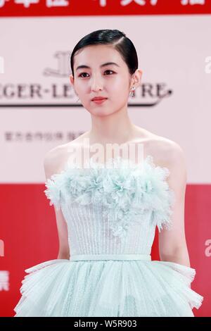 Chinese actress Zhang Zifeng arrives on the red carpet for the closing ceremony of the 22nd Shanghai International Film Festival (SIFF 2019) in Shangh Stock Photo