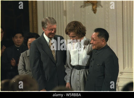 Madame Zhuo Lin, Jimmy Carter, Rosalynn Carter and Deng Xiaoping at the Sino-American signing ceremony. Stock Photo
