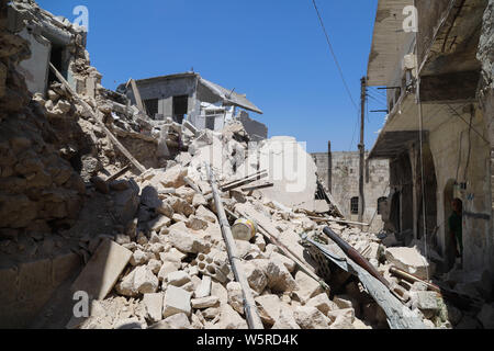 July 25, 2019: The destruction following an air bombardment in the Syrian northern town of Ariha. The airstrikes on the town of Ariha are part of the Syrian government's current campaign to regain the last rebel-held region in Syria (Credit Image: © Juma Mohammad/IMAGESLIVE via ZUMA Wire) Stock Photo