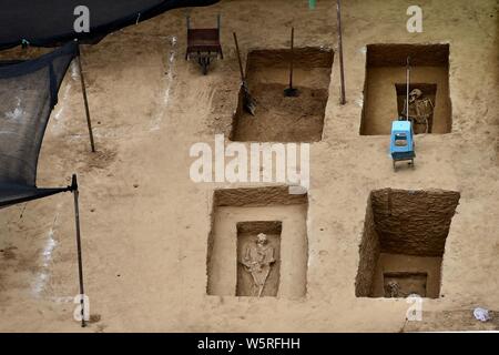 A total of 95 ancient tombs belonging to civilians of the Han Dynasty, and the Ming and Qing dynasties are unearthed from an area where a new building Stock Photo