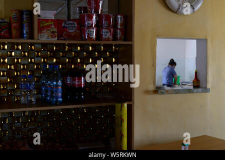 Lady at work in kitchen of a bar/reataurant in Dundgovi Province, Mongolia Stock Photo