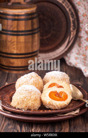 Austrian and czech sweet dessert apricot dumplings. Filled cottage cheese dough. Stock Photo