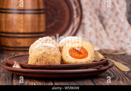 Austrian and czech sweet dessert apricot dumplings. Filled cottage cheese dough. Stock Photo