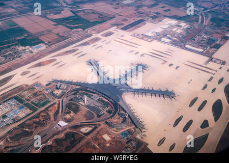 An aerial view of the Qingdao Jiaodong International Airport in Qingdao city, east China's Shandong province, 24 June 2019.   Construction of Qingdao' Stock Photo